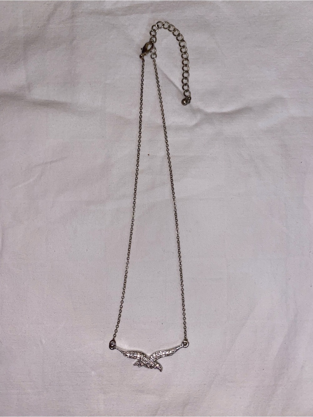 Silver Bird Pendant Necklace with Sparkling Accents